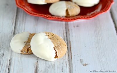 Soft and chewy ginger cookies dipped in white chocolate. Such a yummy Christmas cookie recipe!