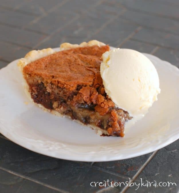 This Chocolate Chip Pie is loaded with pecans, and is rich and delicious! A perfect pie recipe for chocolate and nut lovers!
