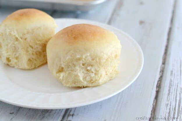 two yummy white rolls on a plate