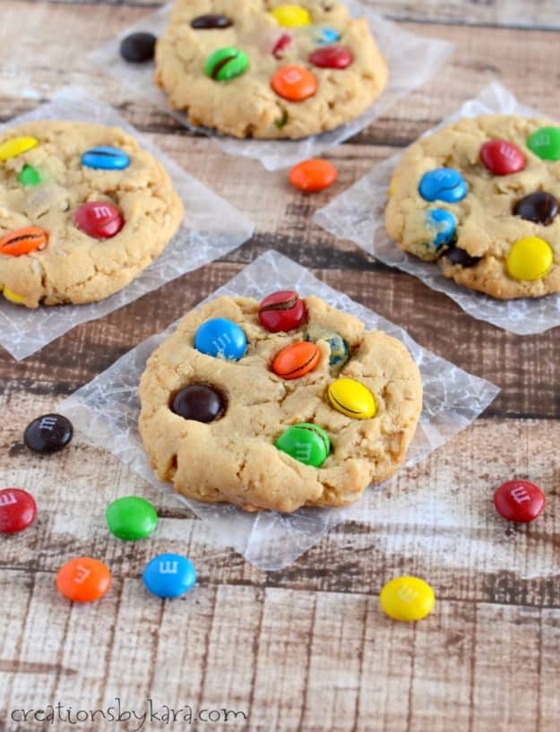 oatmeal peanut butter cookies on waxed paper with M&M's