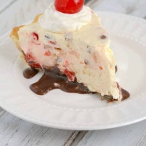 Recipe for cherry almond mousse pie - a no-bake cheesecake with fudge, cherries, and almonds.