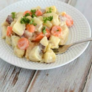 Creamy Dutch oven chicken - made in the oven instead of over coals. A favorite chicken recipe!