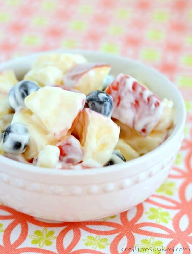 Easy and delicious fruit salad with sour cream dressing.