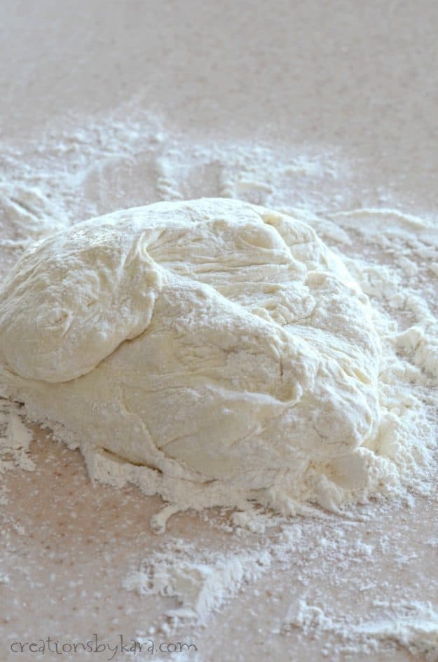 artisan bread dough on a floured counter