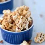 Whip up a batch of this Cinnamon Roll Caramel Corn for movie night, or gift giving. It's crunchy, sweet, cinnamony, and highly addictive. A perfect holiday caramel corn recipe!