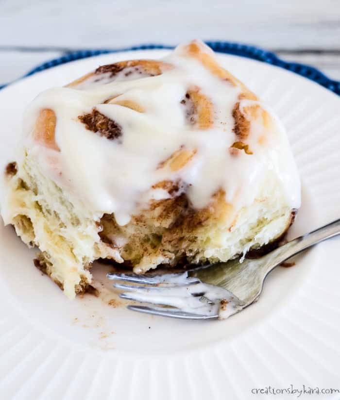 ooey gooey yeast cinnamon roll with cream cheese frosting