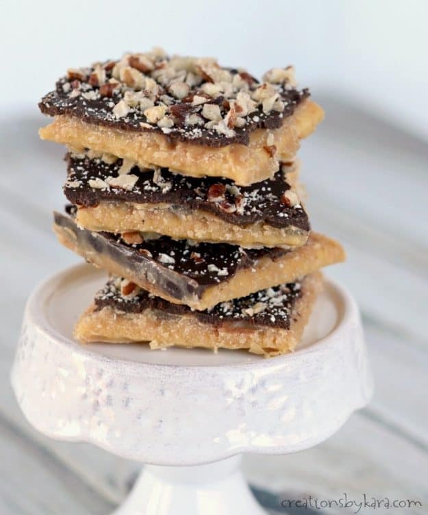 stack of cracker toffee on a cupcake stand