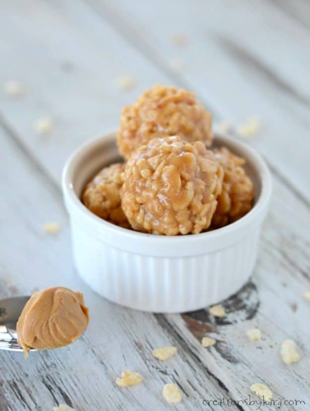 Gluten free, no-bake peanut butter balls with rice crispies in a white bowl
