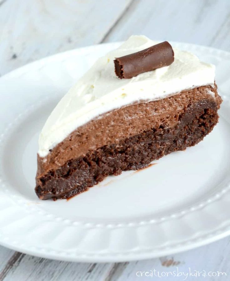 With a fudgy brownie layer, silky smooth chocolate mousse, and whipped cream, this Chocolate Mousse Cake is an epic dessert recipe. Sure to please any chocolate lover!