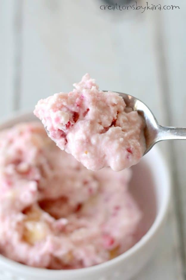 close up of a spoonful of fruit ice cream