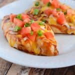 Recipe for Monterey Chicken - topped with BBQ sauce, cheese, and diced tomatoes, this chicken recipe is always well received! An easy family friendly recipe!