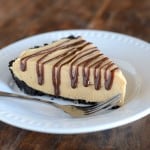 This easy Peanut Butter Pie is rich and delicious, especially drizzled with chocolate sauce!