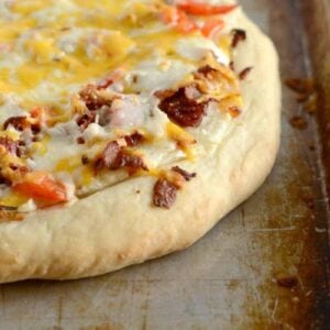 Bacon Potato Pizza is a tasty change from traditional pizza. Such a yummy recipe for using up leftover mashed potatoes!