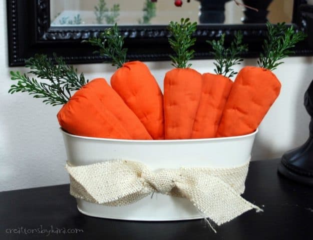 basket of fabric carrots tied with burlap