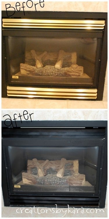 Fireplace Makeover {Spray Paint Magic} How to make over a brass fireplace using black spray paint. A fast and easy DIY project!