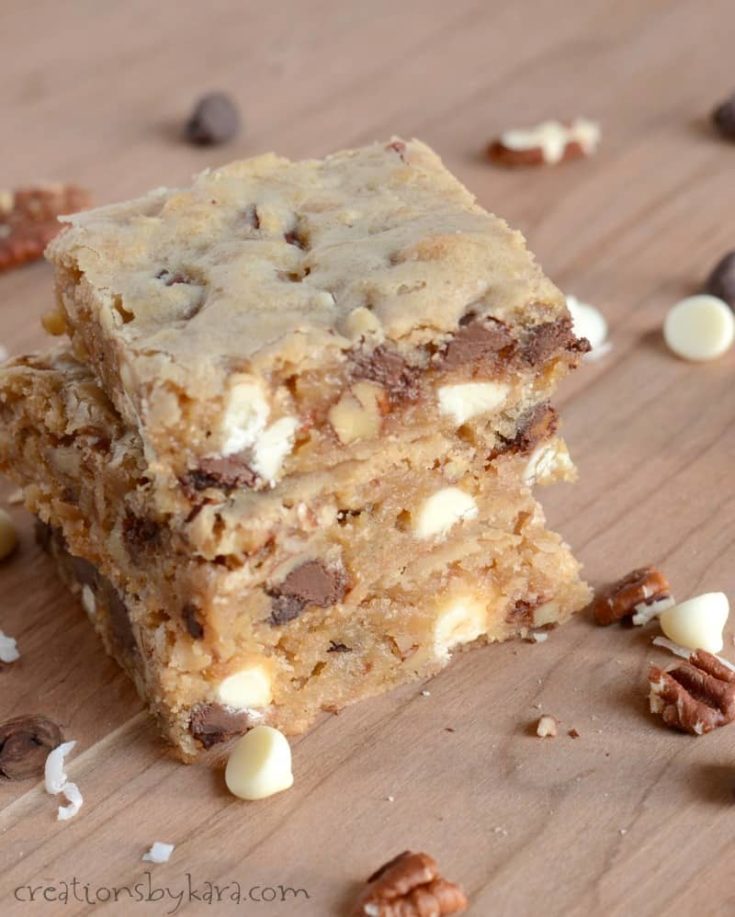Blondies with two kinds of chocolate, coconut, and nuts. Chewy and amazingly delicious!