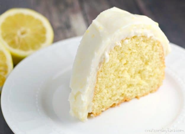 slice of lemon bundt cake with lemon cream cheese frosting