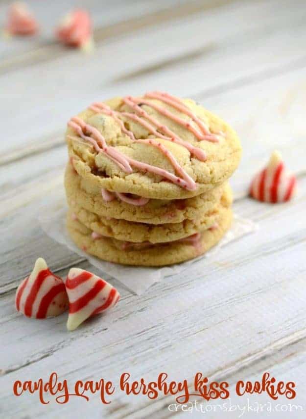 stack of peppermint chocolate chip cookies drizzled with melted peppermint kisses