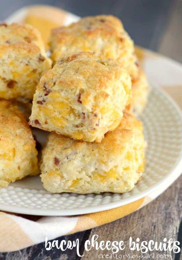 plate of biscuits with bacon and cheese