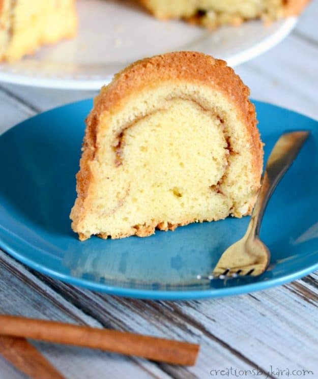 slice of cinnamon bundt cake on a plate with a fork