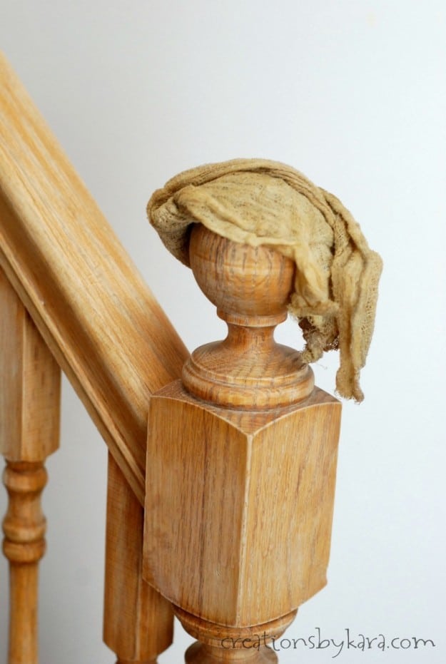 How to transform an ugly banister with stain and paint.
