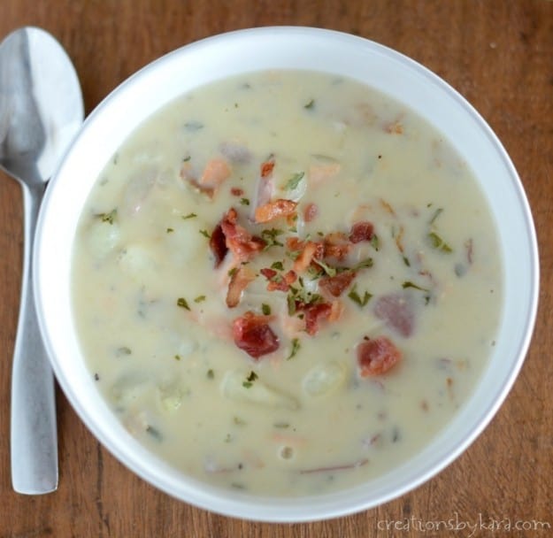 overhead shot of chowder with salmon, potatoes, and bacon