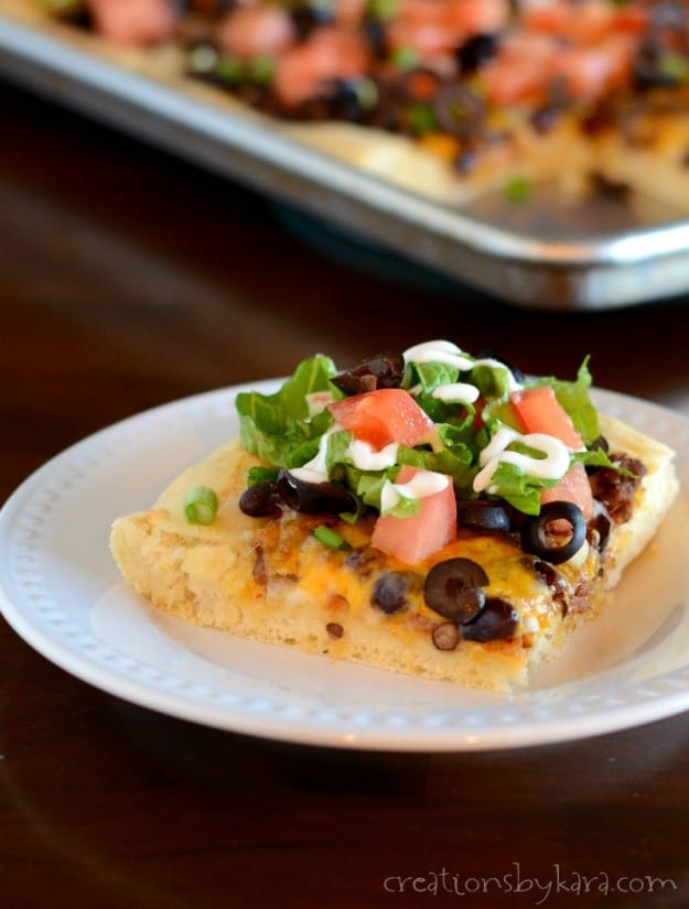 This Taco Pizza was a huge hit for dinner at my house! It's a fun way to serve two classics.