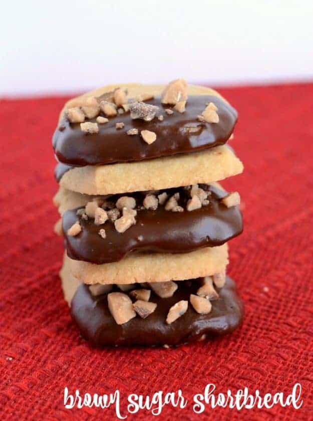 Brown Sugar Shortbread Cookies dipped in chocolate and sprinkled with toffee.