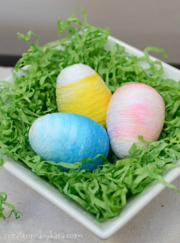 How to make Yarn Wrapped Ombre Easter Eggs. So fun for spring and Easter decor!