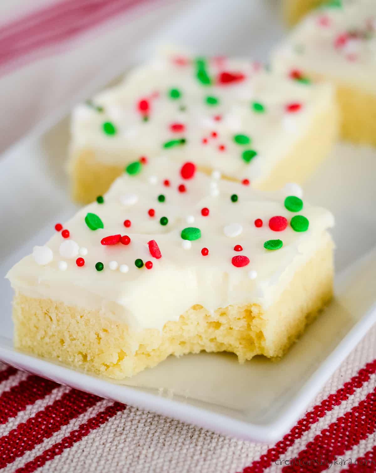 christmas sugar cookie bars with red and green sprinkles