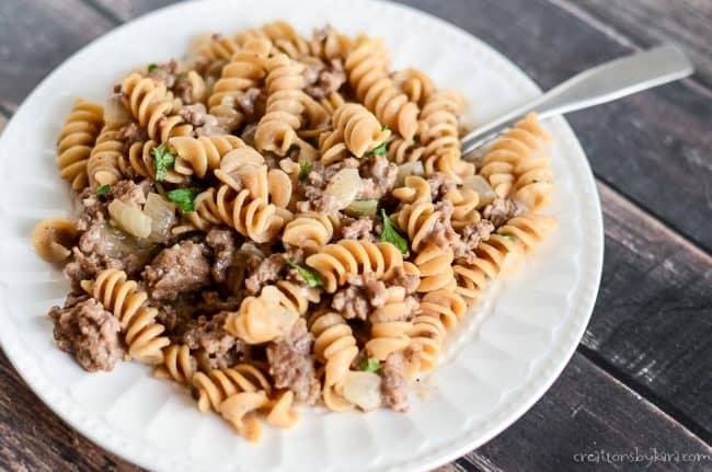 ground beef stroganoff on a plate with a fork