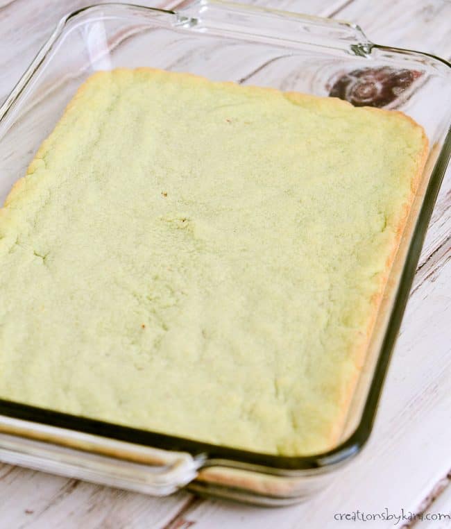 cooled pan of pistachio sugar cookie bars