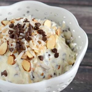 Almond Joy Dip - serve this sweet creamy dip with fruit, graham crackers, or pretzels for a yummy and easy snack. Almond Joy fans will love this dip recipe!