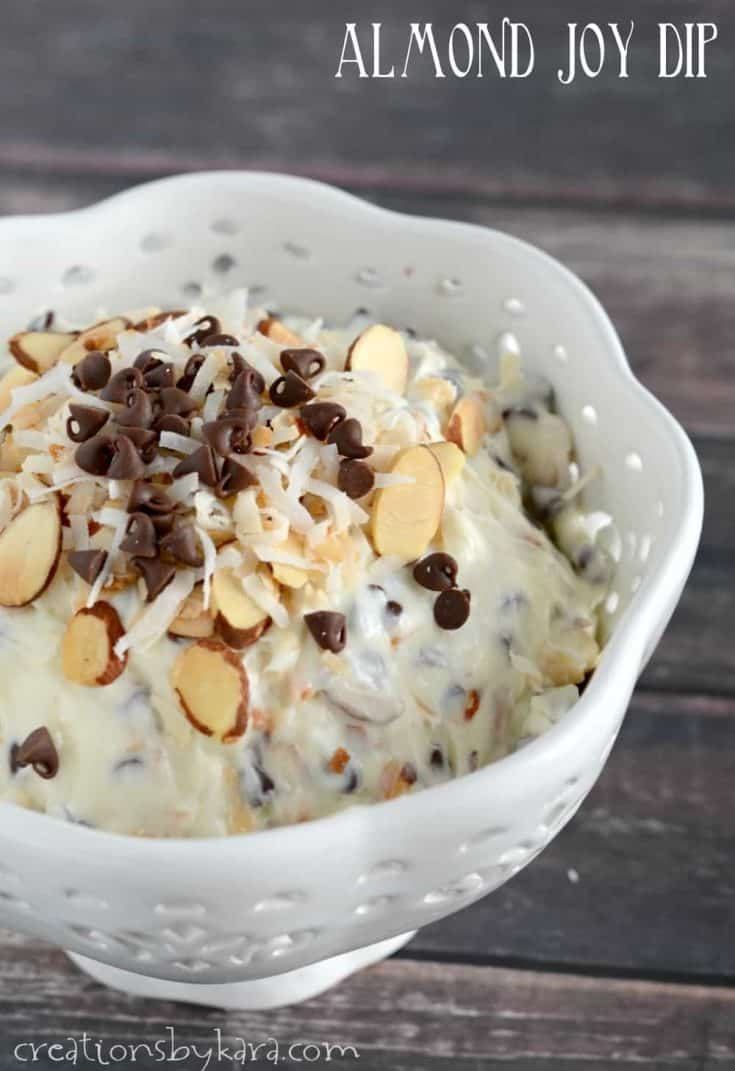 Almond Joy Dip - serve this sweet creamy dip with fruit, graham crackers, or pretzels for a yummy and easy snack. Almond Joy fans will love this dip recipe!