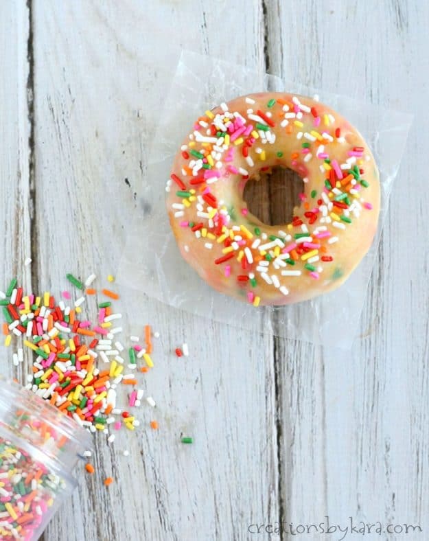 overhead shot of baked donut with sprinkles