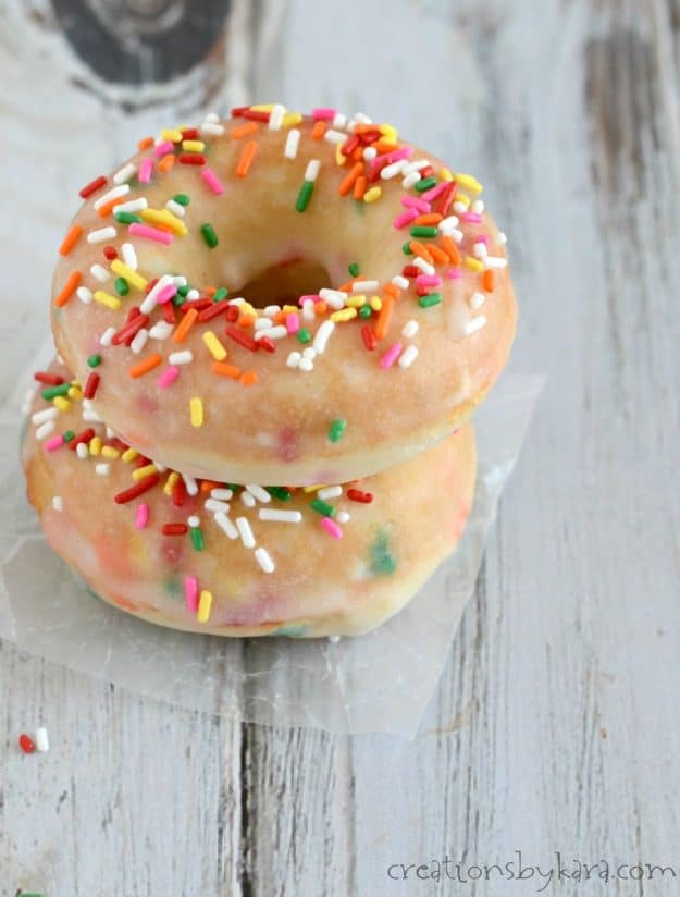 stack of funfetti donuts on waxed paper