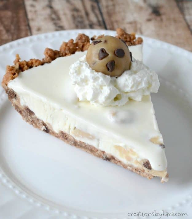 close up of ice cream pie topped with a ball of edible cookie dough