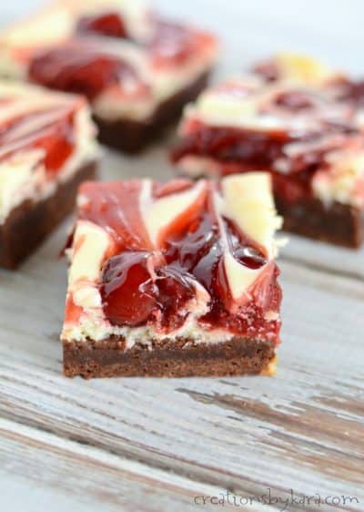Fudgy brownies with a creamy cheesecake layer and a swirl of cherry pie filling. Everyone will love these decadent brownies.
