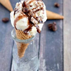 Homemade Tin Roof Sundae Ice Cream - creamy vanilla ice cream with chocolate fudge swirls and chunks of chocolate covered peanuts. A decadent ice cream recipe!