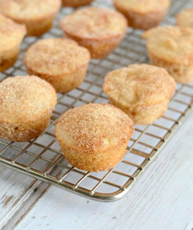 mini apple muffin coated with cinnamon sugar