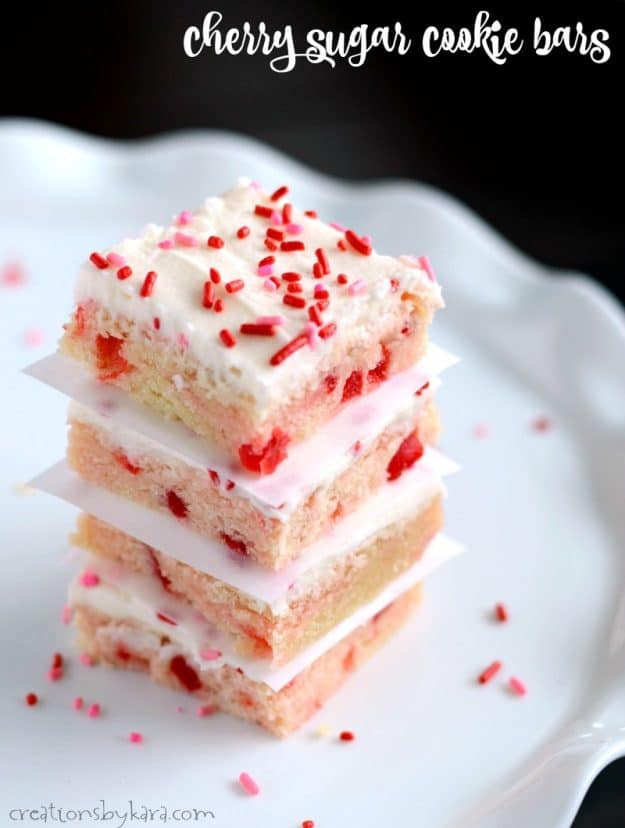 stack of cherry sugar cookie bars on a tray
