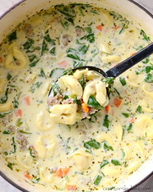 pot of creamy soup with sausage and tortellini