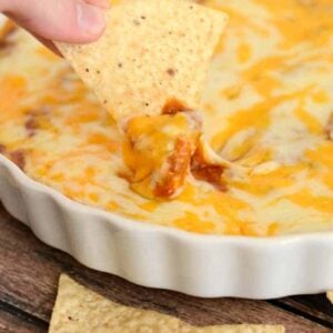 Chili Cheese Dip - loaded with beans, cream cheese, and two kinds of cheeses, this dip is always a hit! #dip #appetizer #cheese