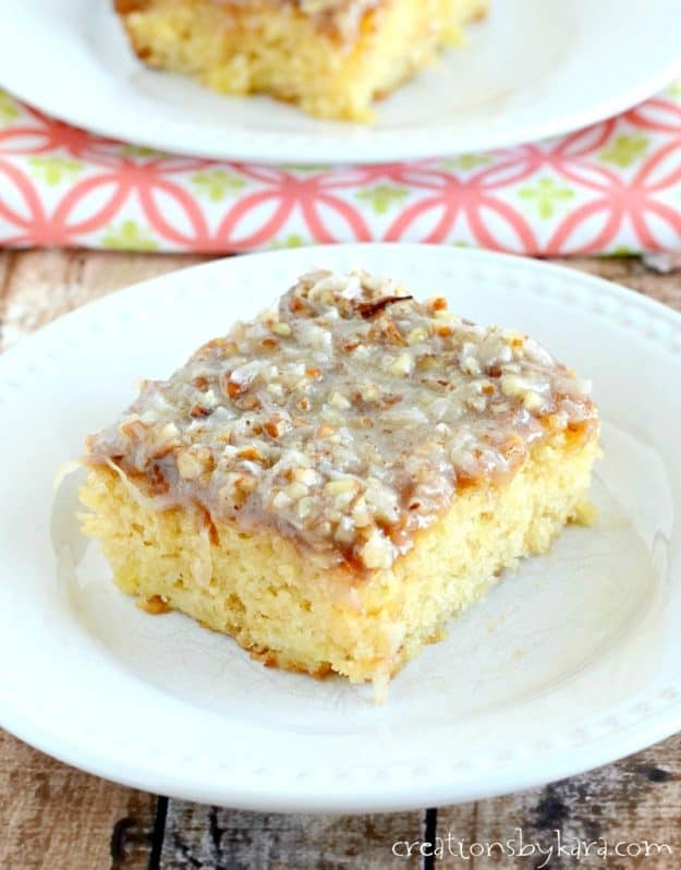 slice of pineapple cake with boiled coconut pecan frosting