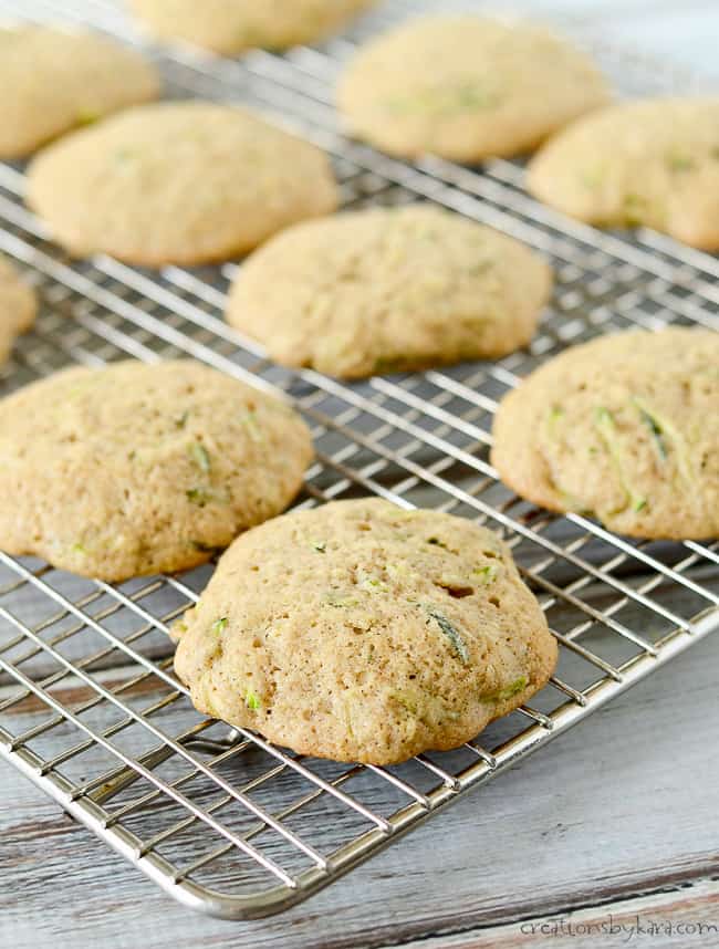 baked zucchini cookies on cooling rack