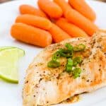 plate of chicken with lime butter and carrots