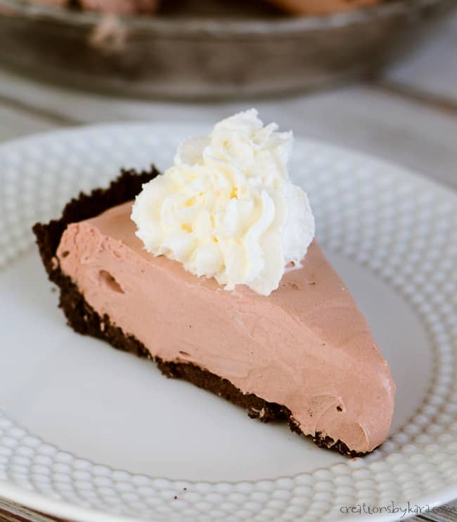 slice of creamy chocolate pie on a white plate