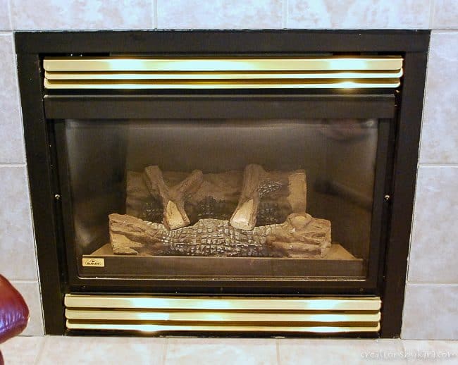 old brass fireplace before makeover