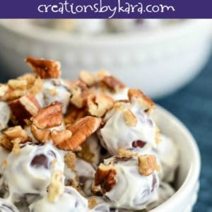 grapes in a cream cheese dressing topped with pecans