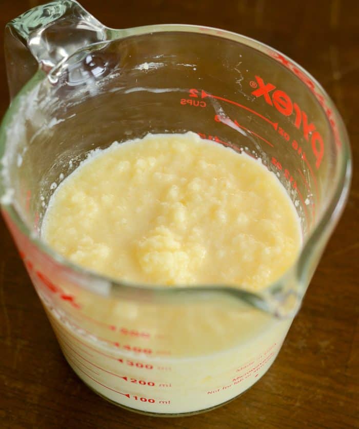 melted butter and milk in a measuring cup